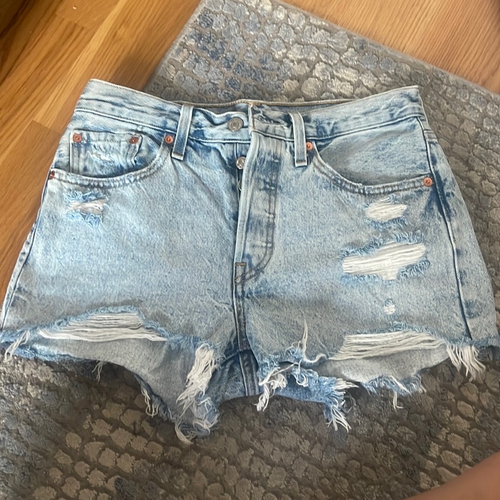LEVIS distressed size 27 denim shorts